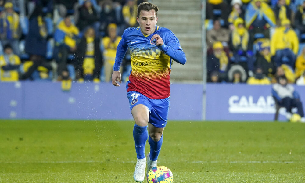 Germán valera en un partit al Nacional / 21-22